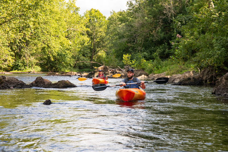 Two people kayaking.